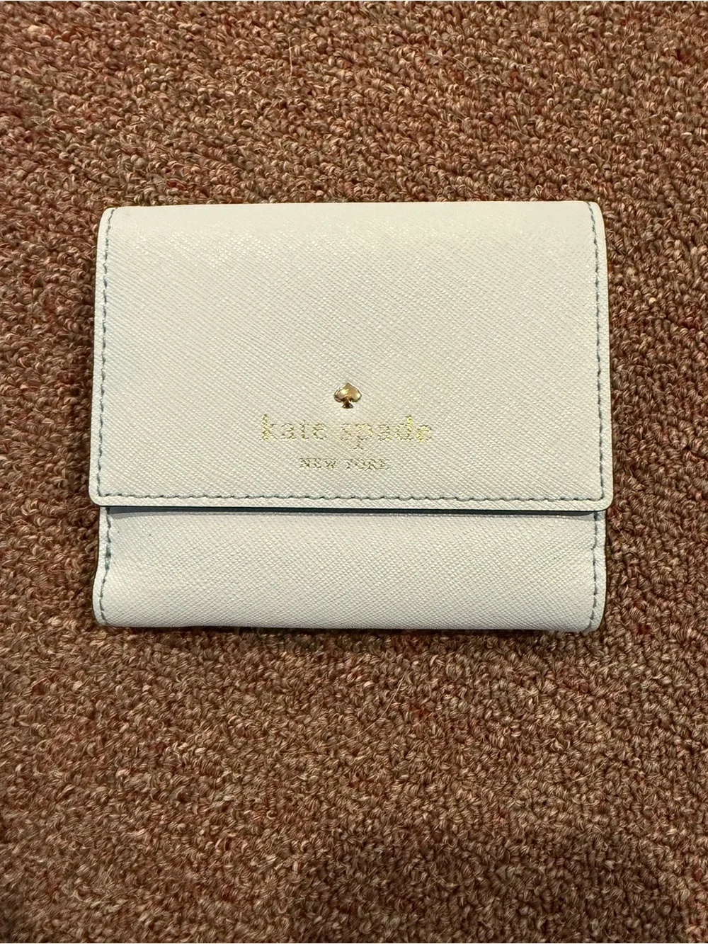 kate spade ivory compact leather card holder with gold logo